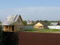 Вид на участок с домом в поселке Солнечное Спирино